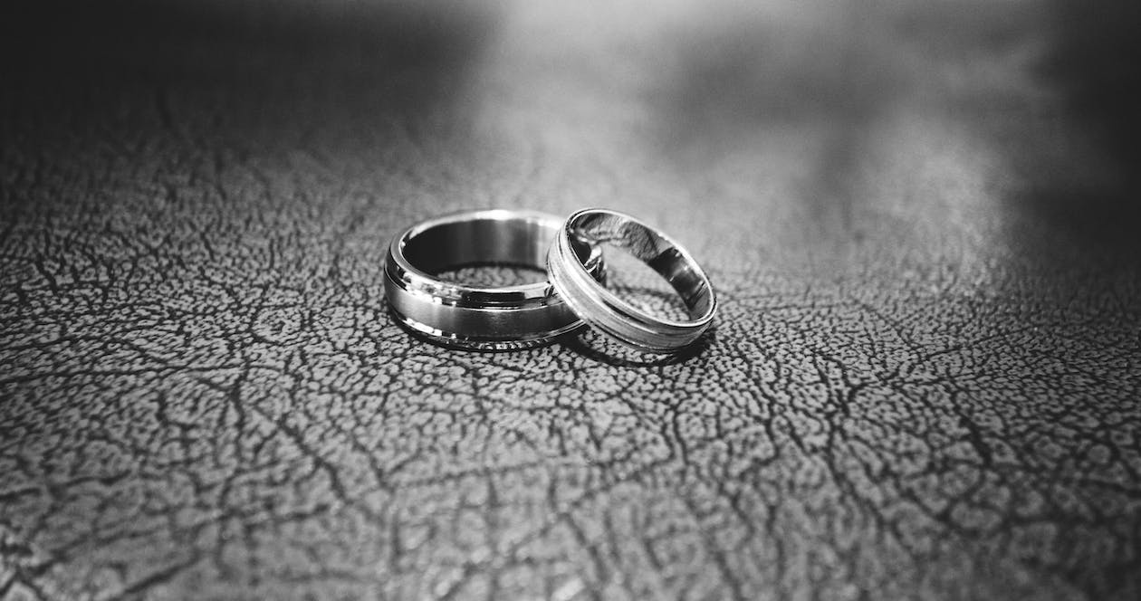 Free Close-up of Wedding Rings on Floor Stock Photo