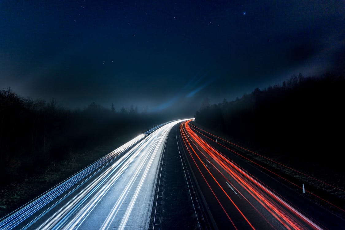 Free Light Trails on Highway at Night Stock Photo