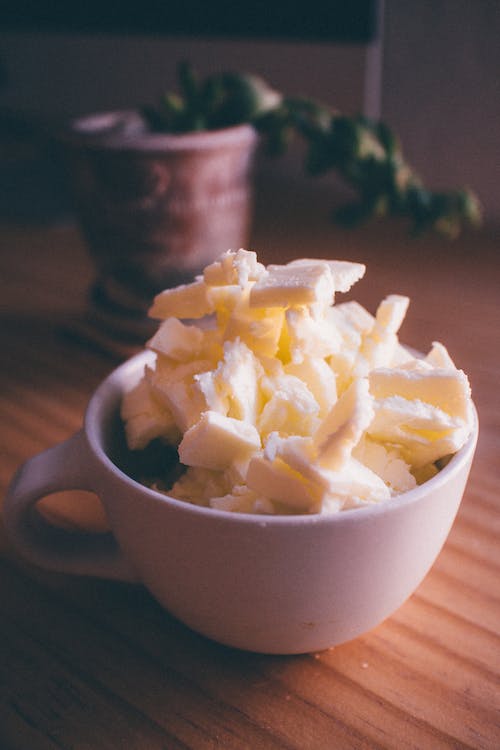 Free White Ceramic Mug With Butter Stock Photo