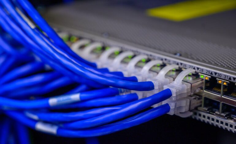 Free Cables Connected to Ethernet Ports Stock Photo