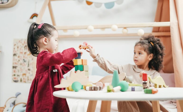 Free Girl In Red Dress Playing A wooden Blocks Stock Photo