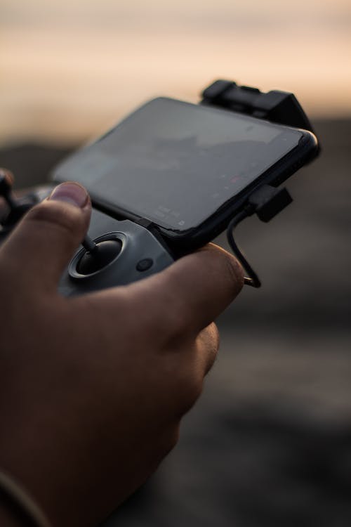 Free Person Steering a Drone Stock Photo