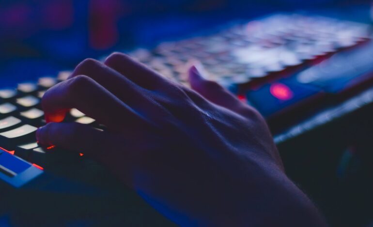 photo of person typing on computer keyboard