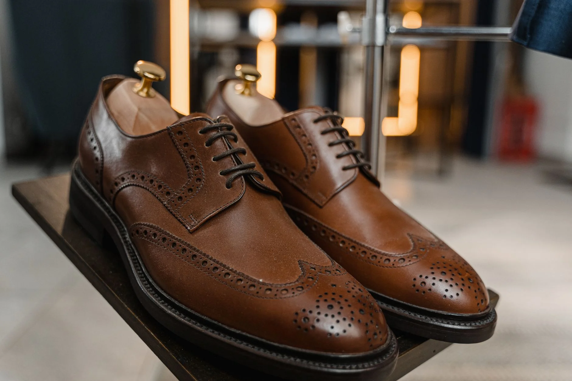 Brown leather brogue shoes on display