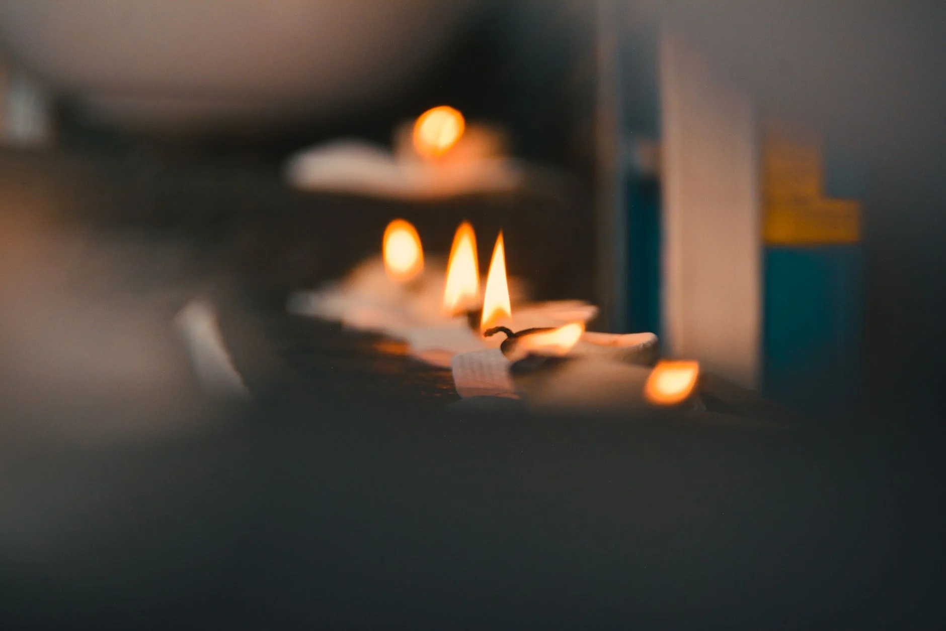 Candle flames burning wax