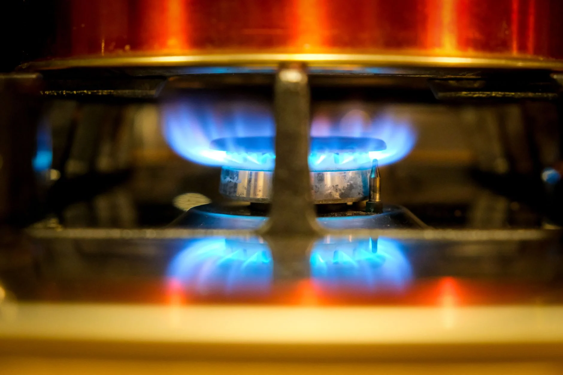 Blue flames on a gas hob burner