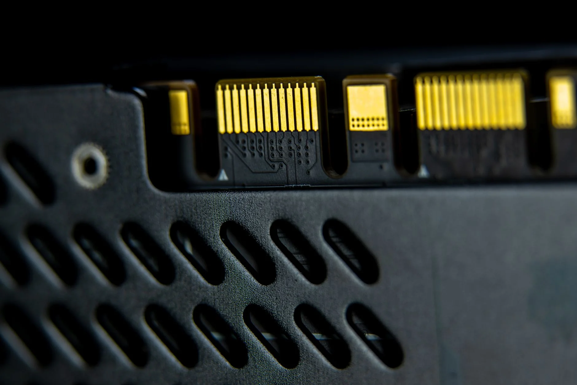 Gold-plated electronic connector pins on a computer component