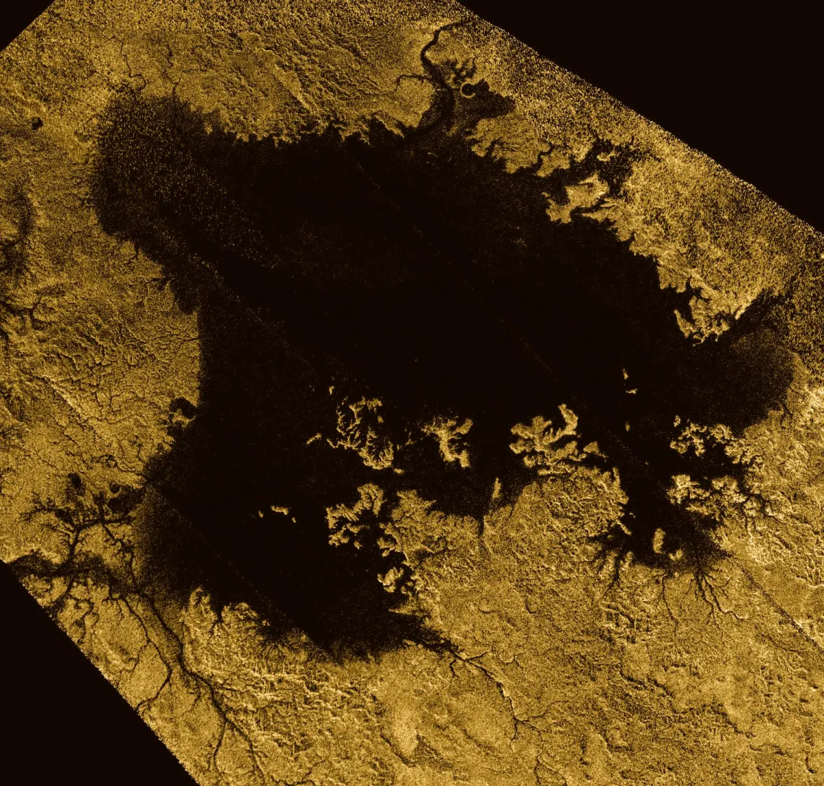 Radar image of Ligeia Mare, a large sea of liquid methane and ethane near Titan’s north pole, with branching inlets along its coast