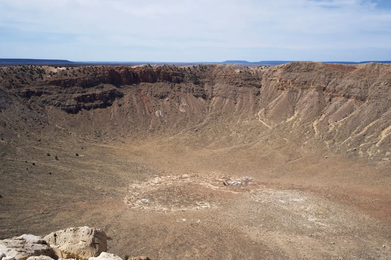 Barringer Meteor Crater in Arizona, a huge round impact crater in the desert