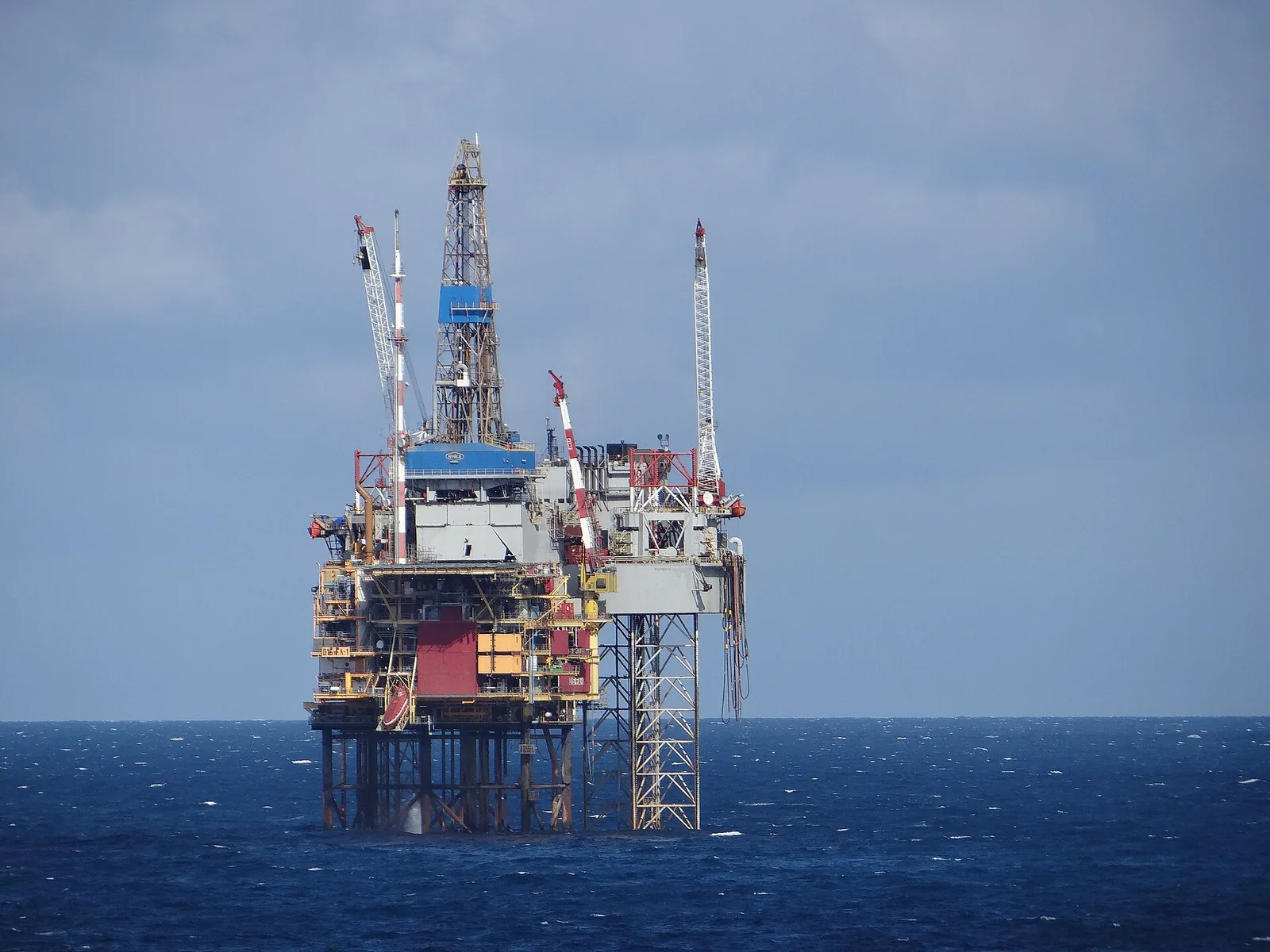 An oil and gas platform standing in the North Sea