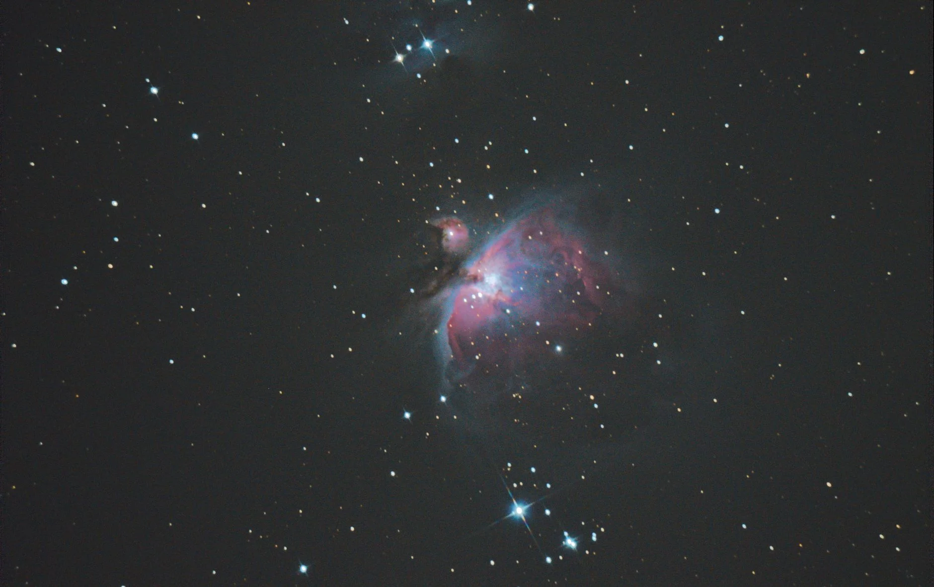 The Orion Nebula, a star-forming cloud of glowing gas and dust