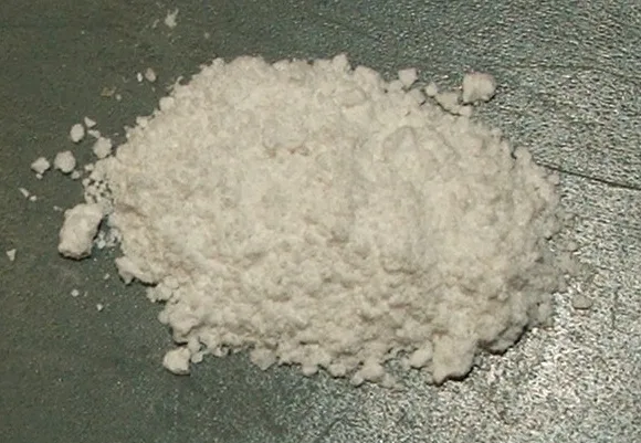 A small heap of white sodium silicate powder