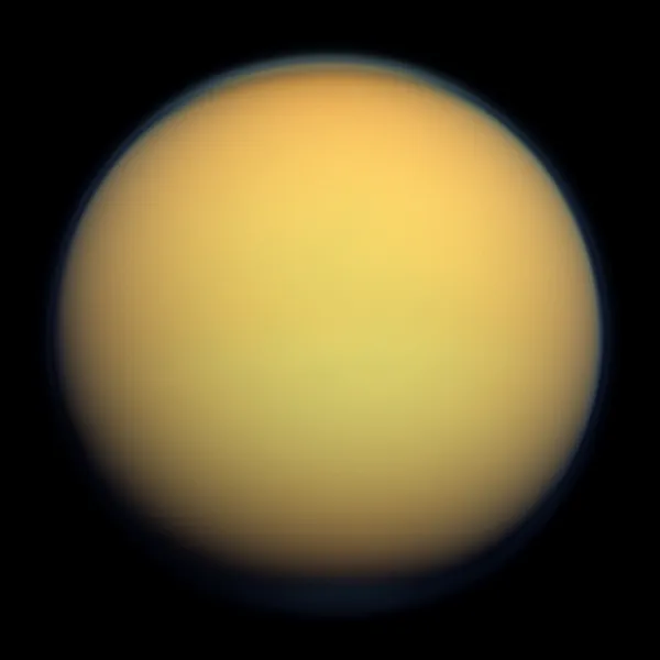 Titan in true colour from the Cassini spacecraft: a smooth orange ball of haze