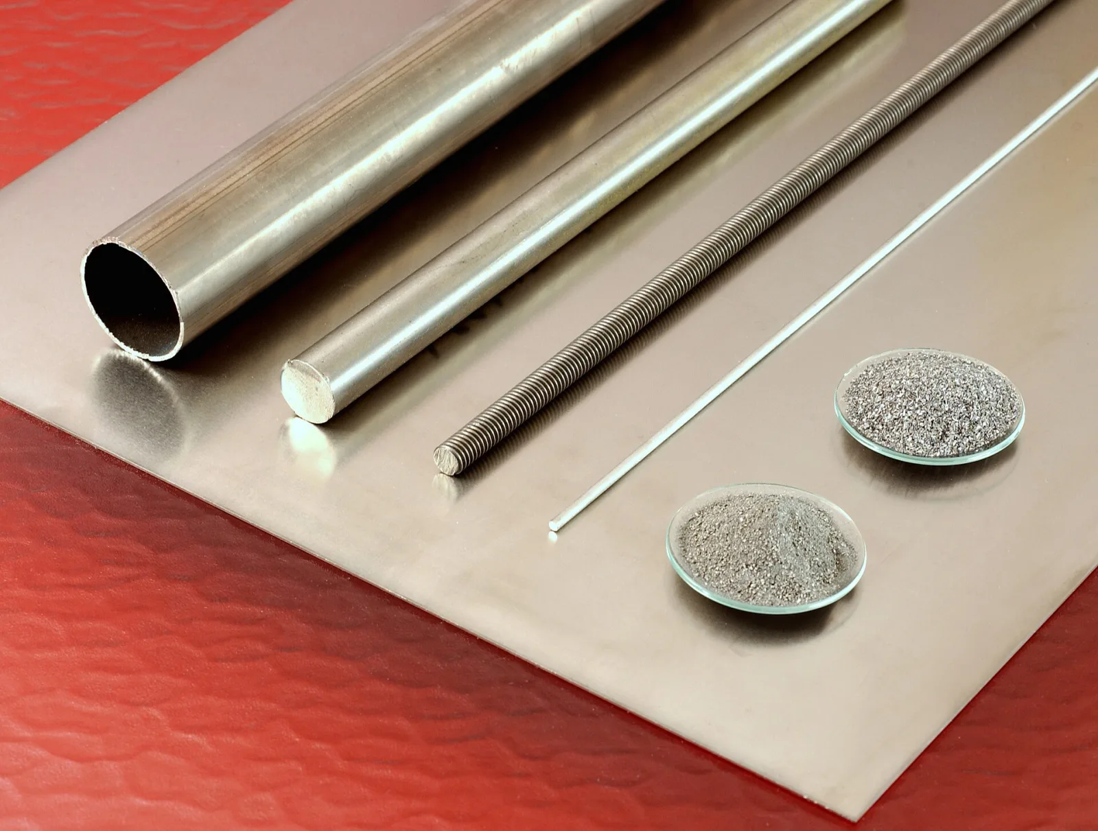 Titanium tube, rods, wire, sheet and powder